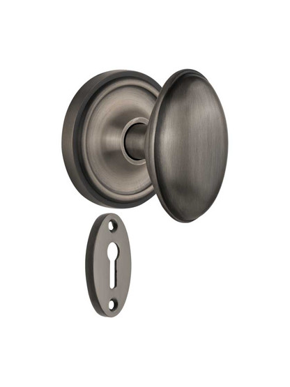 Classic Rosette Mortise-Lock Set with Homestead Knobs in Antique Pewter.